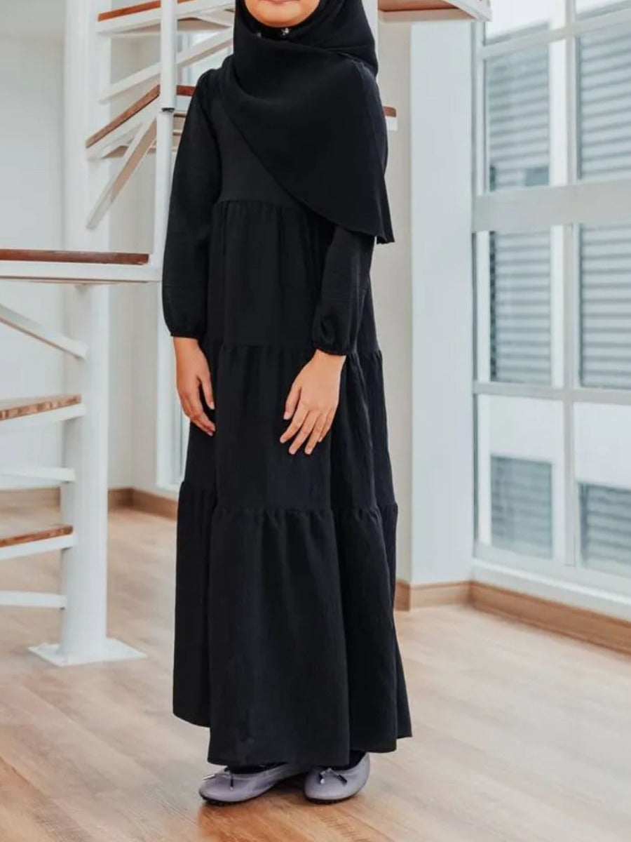 Layers of Grace: Multi-Layered Closed Abaya for Young Ones.