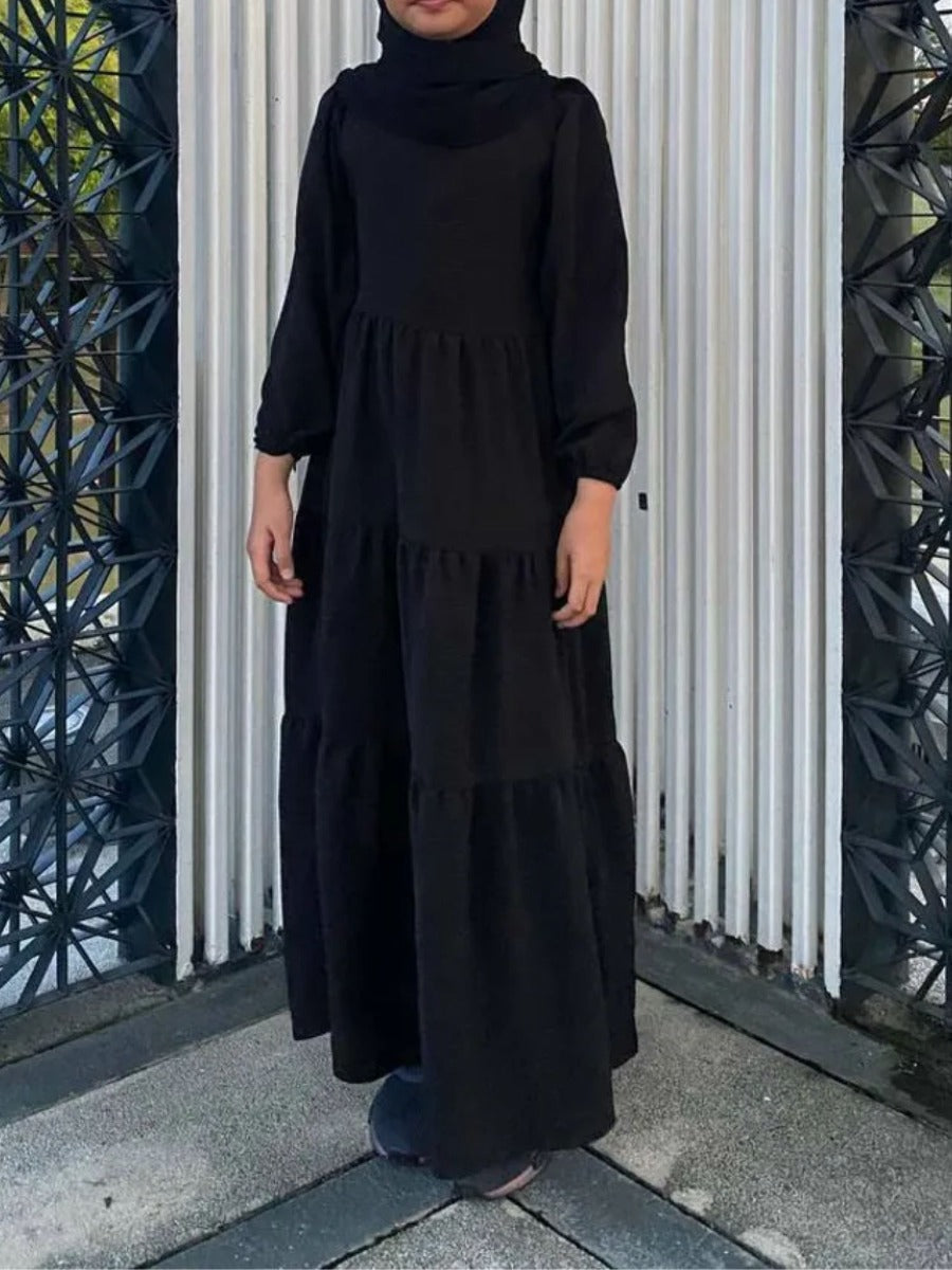 Layers of Grace: Multi-Layered Closed Abaya for Young Ones.