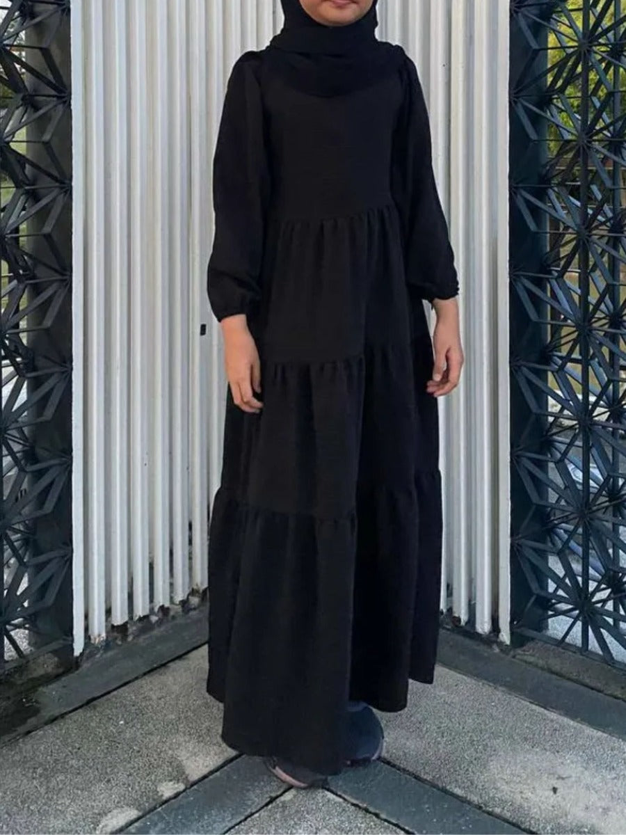 Layers of Grace: Multi-Layered Closed Abaya for Young Ones.