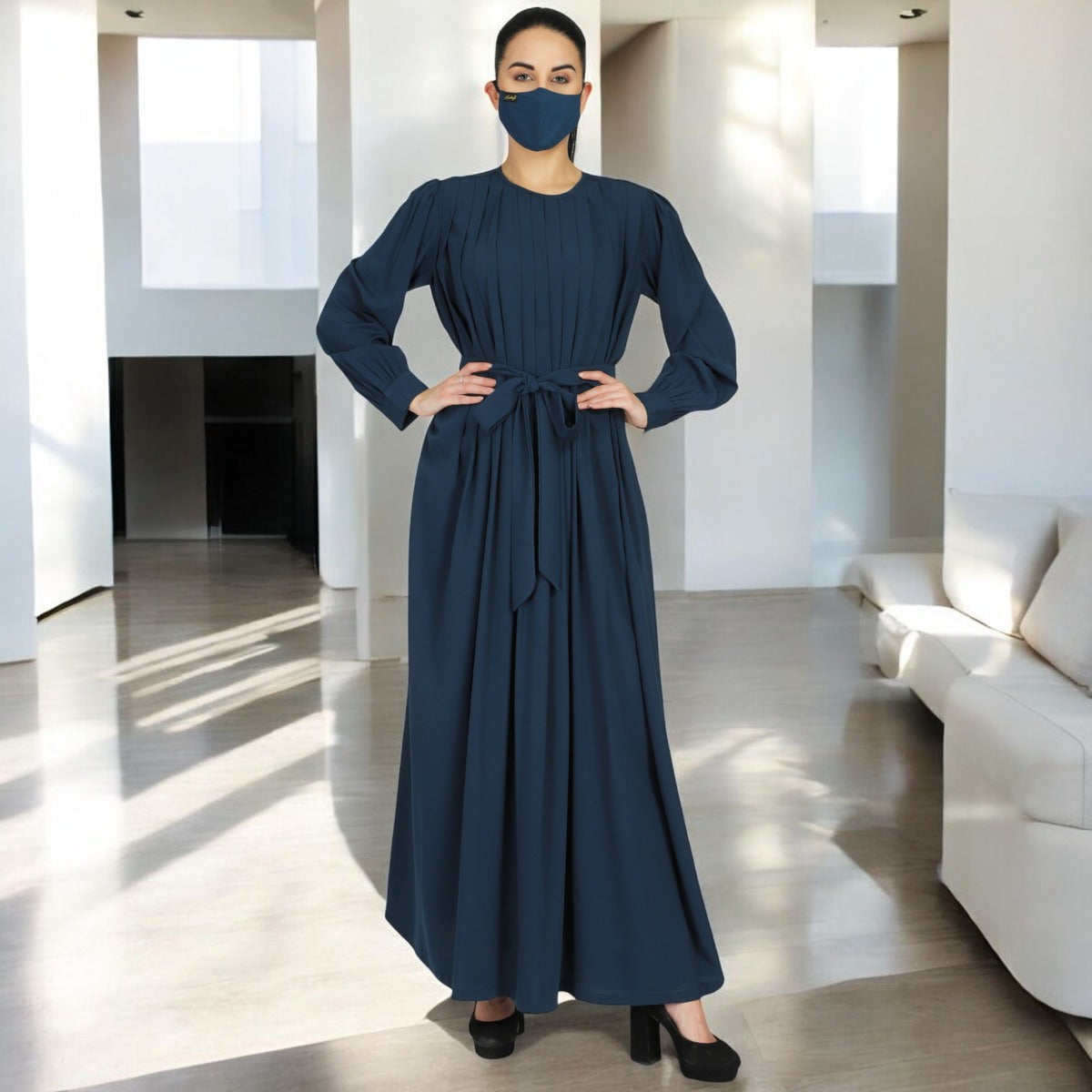 Abaya With Multiple Pleats And Belt. Comes With A Matching Hijab.
