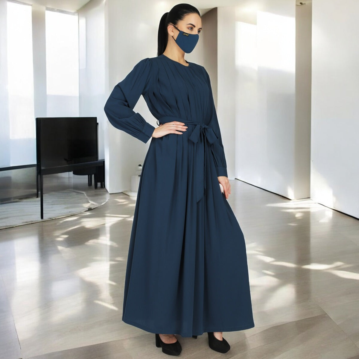Abaya With Multiple Pleats And Belt. Comes With A Matching Hijab.