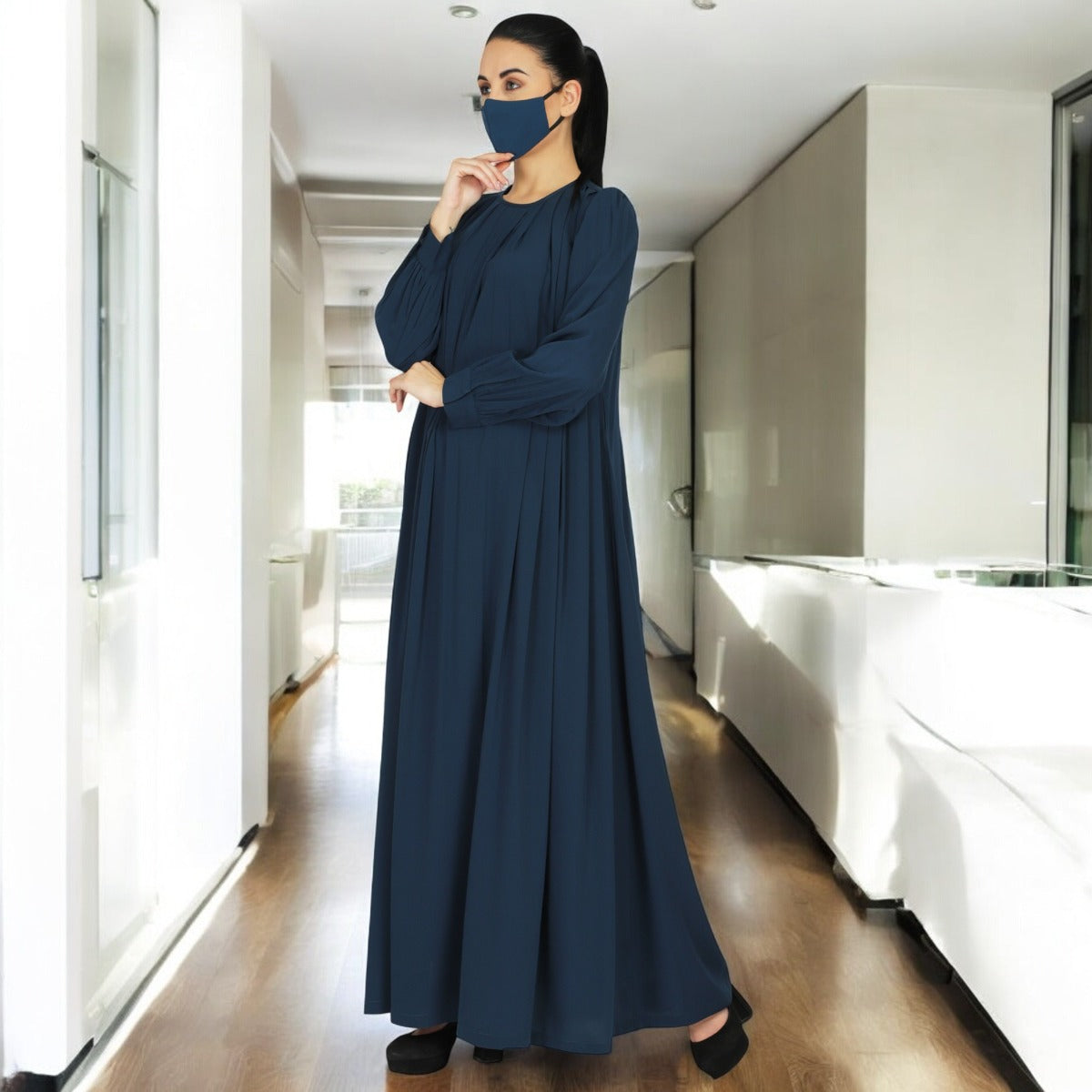 Abaya With Multiple Pleats And Belt. Comes With A Matching Hijab.