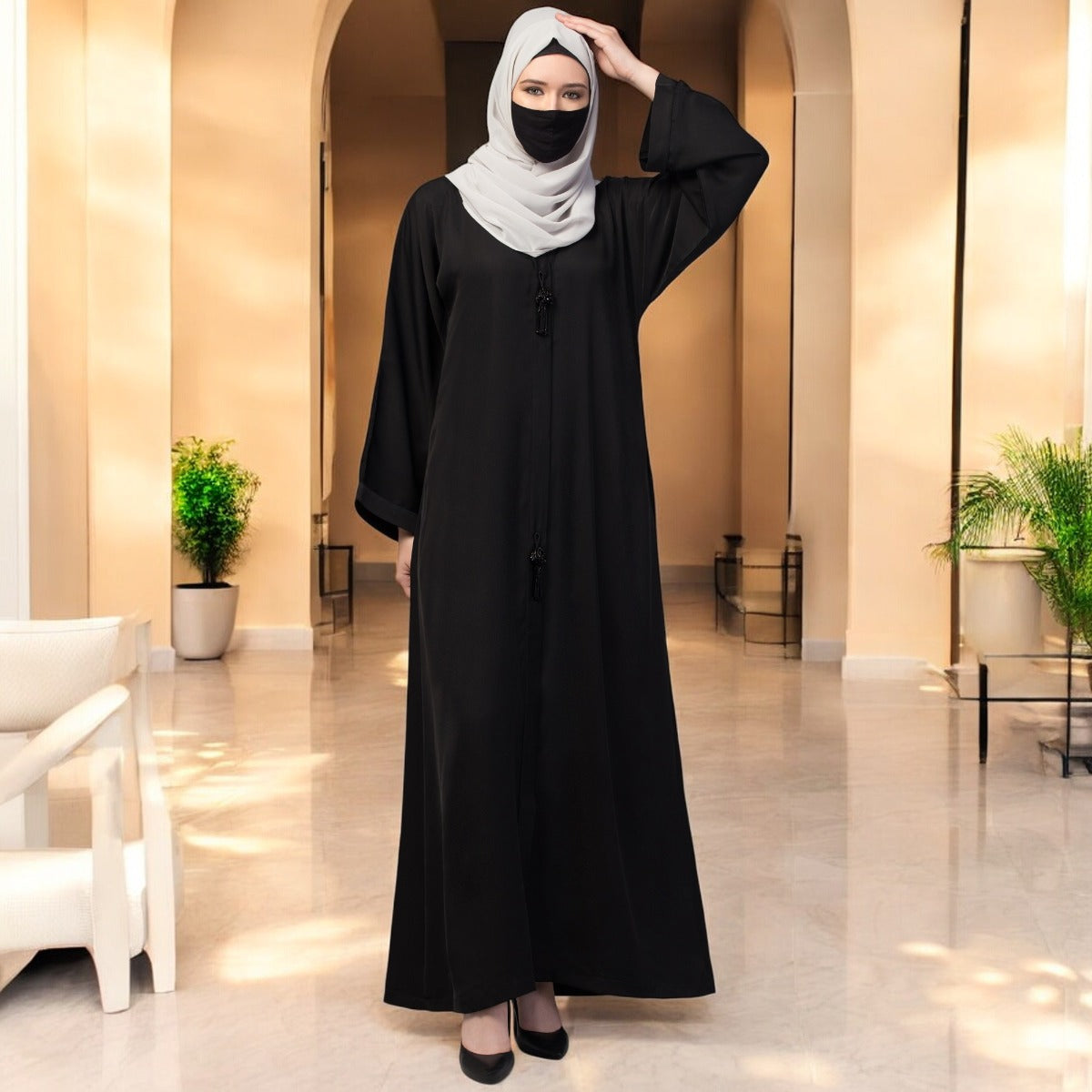 Front Open Abaya In Premium Praada Fabric With Embellished Tassels