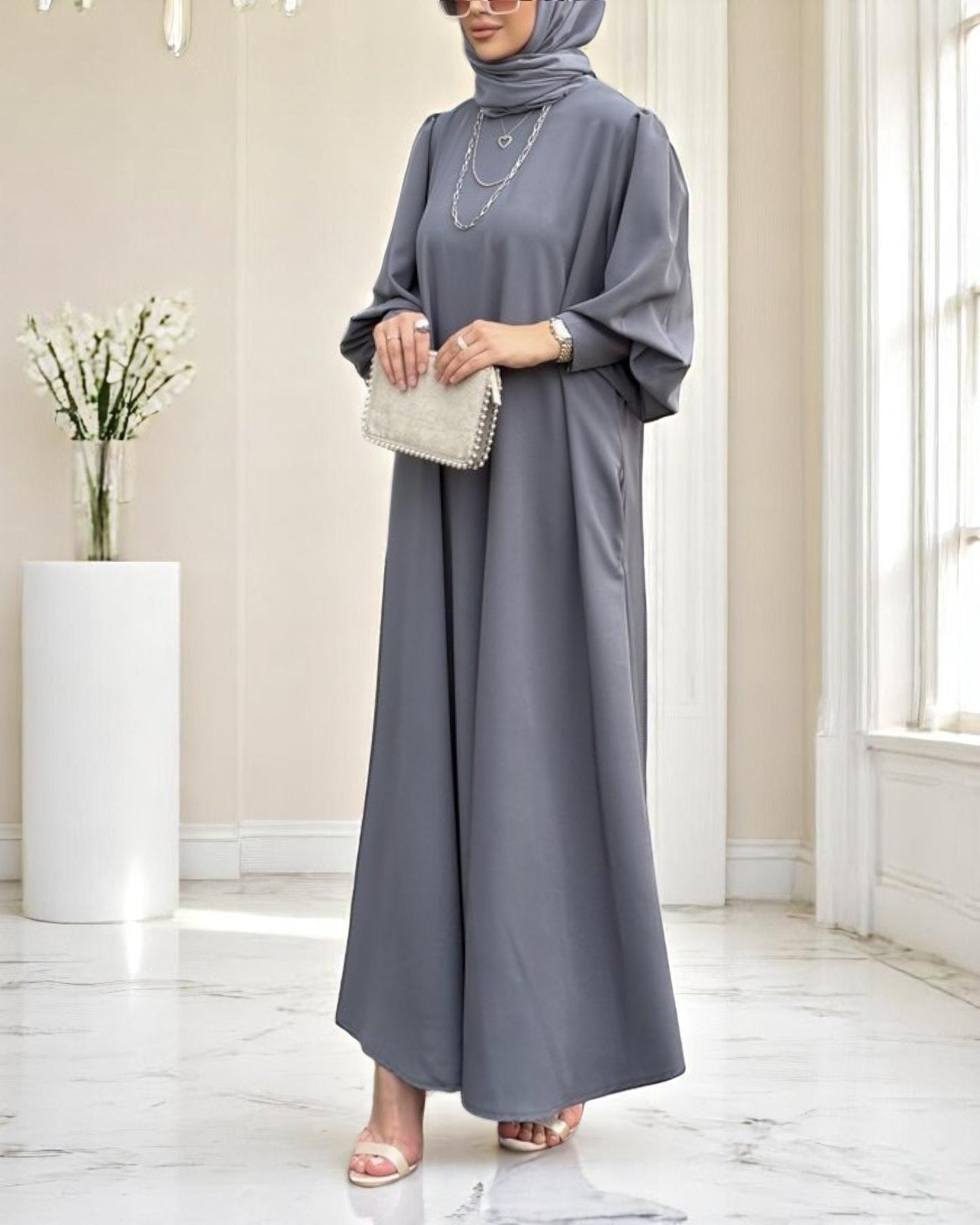 Simple Yet Elegant Abaya in Premium Praada Fabric with Cuff Sleeves and Matching Belt