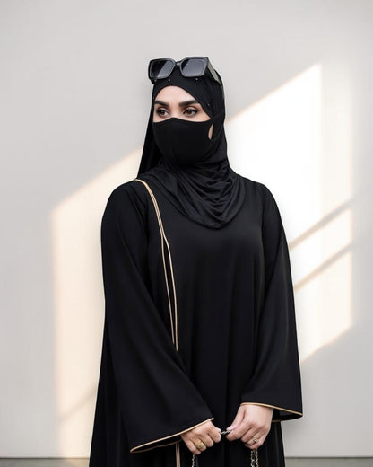 Designer Black Closed Abaya with Contrast Piping and Extra Flare