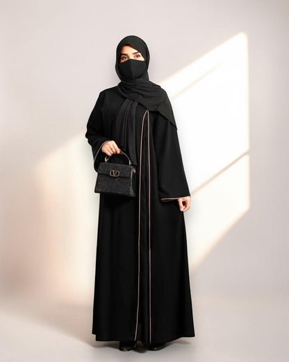 Designer Black Closed Abaya with Contrast Piping and Extra Flare
