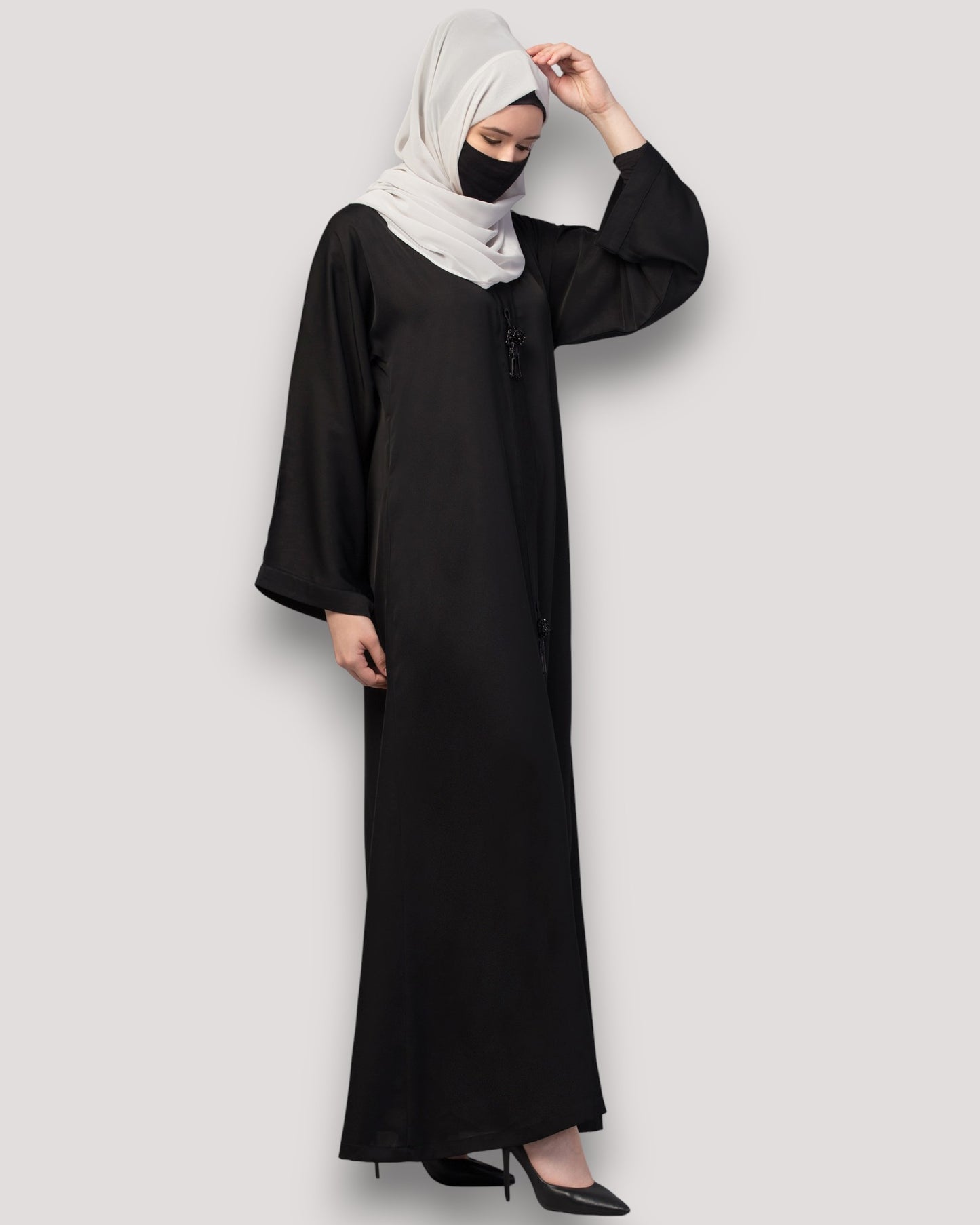Front Open Abaya In Premium Praada Fabric With Embellished Tassels