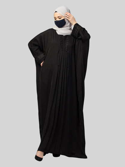 Designer Kaftan Abaya With Lacework & Tussels in Imported Nida Fabric.
