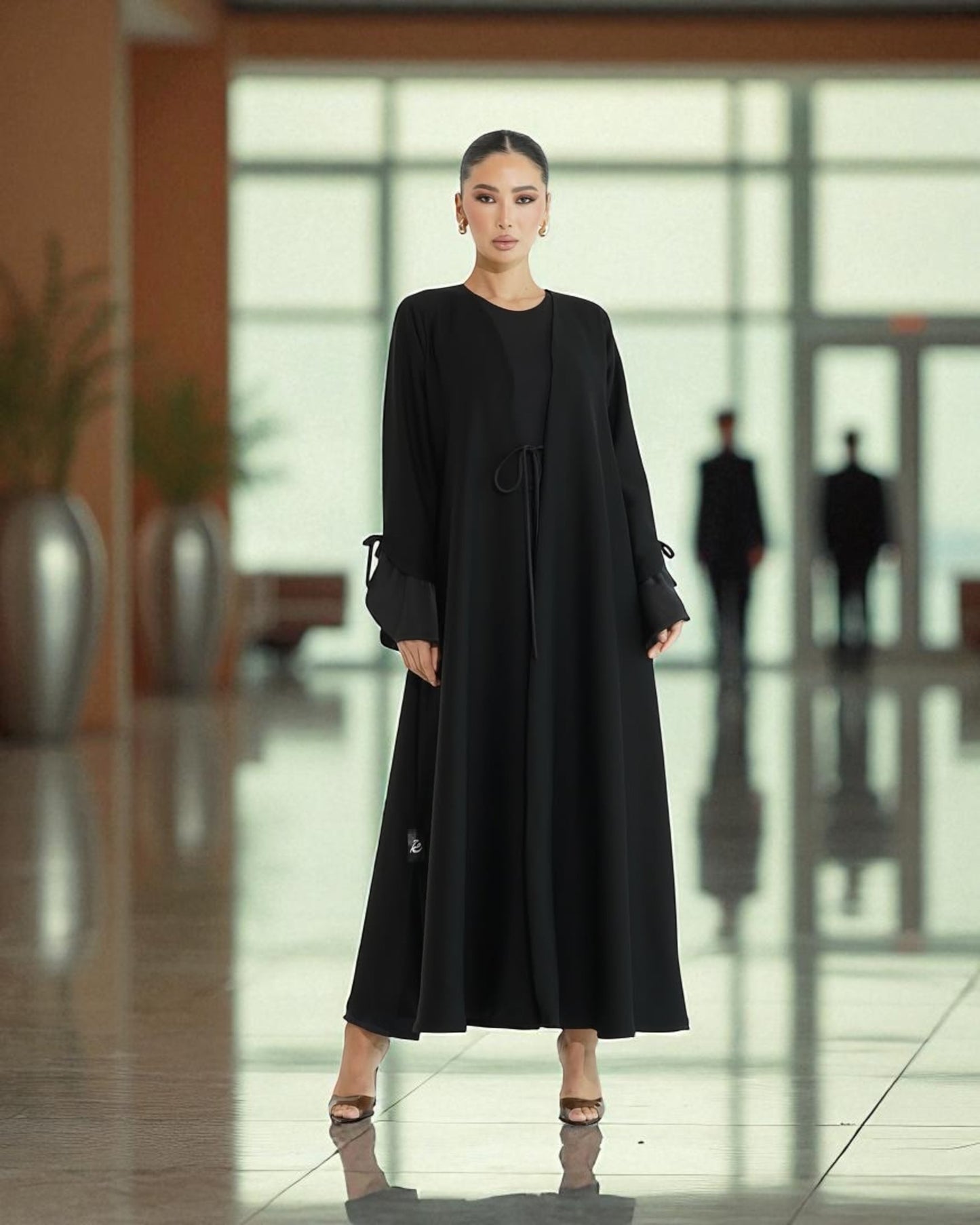 Elegant Flowing Black Abaya Online with Statement Flounce Cuff Sleeves