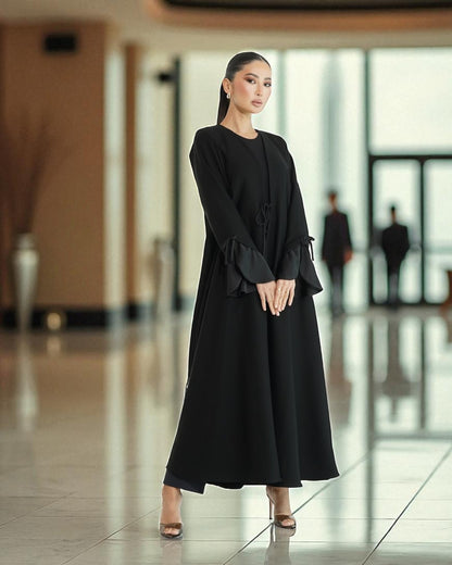 Elegant Flowing Black Abaya Online with Statement Flounce Cuff Sleeves