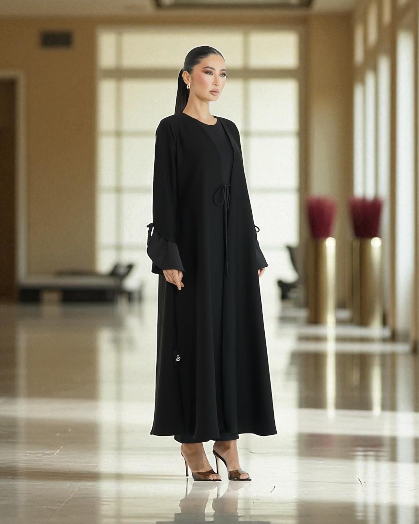 Elegant Flowing Black Abaya Online with Statement Flounce Cuff Sleeves