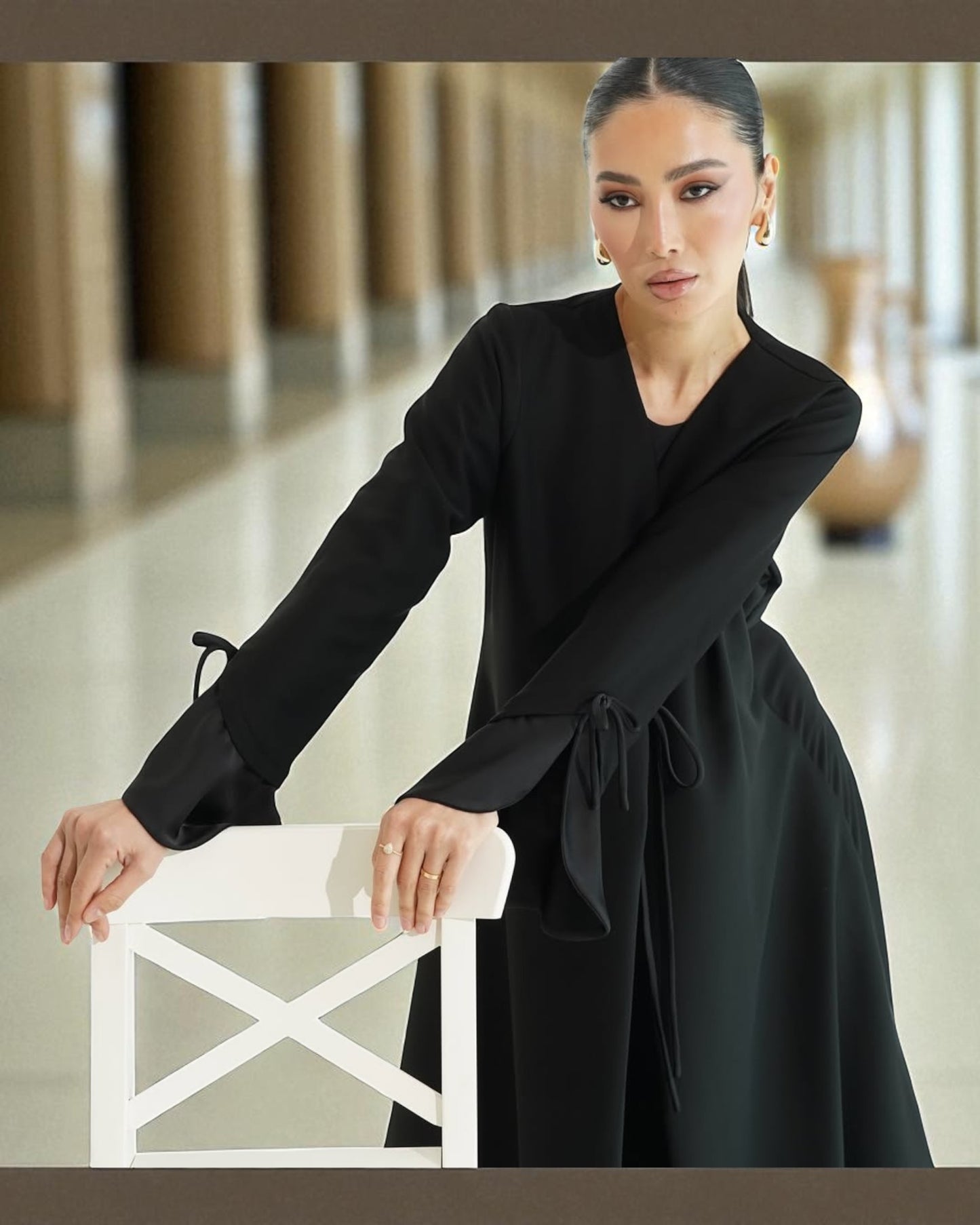 Elegant Flowing Black Abaya Online with Statement Flounce Cuff Sleeves